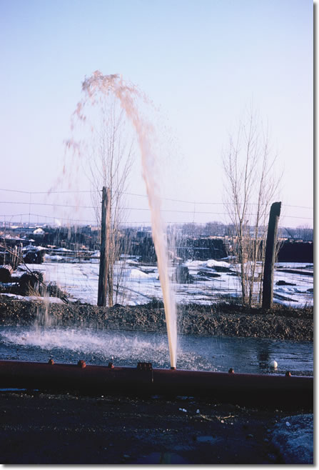 Geyser from pipe in front of Republic Creosting - Spring 1965