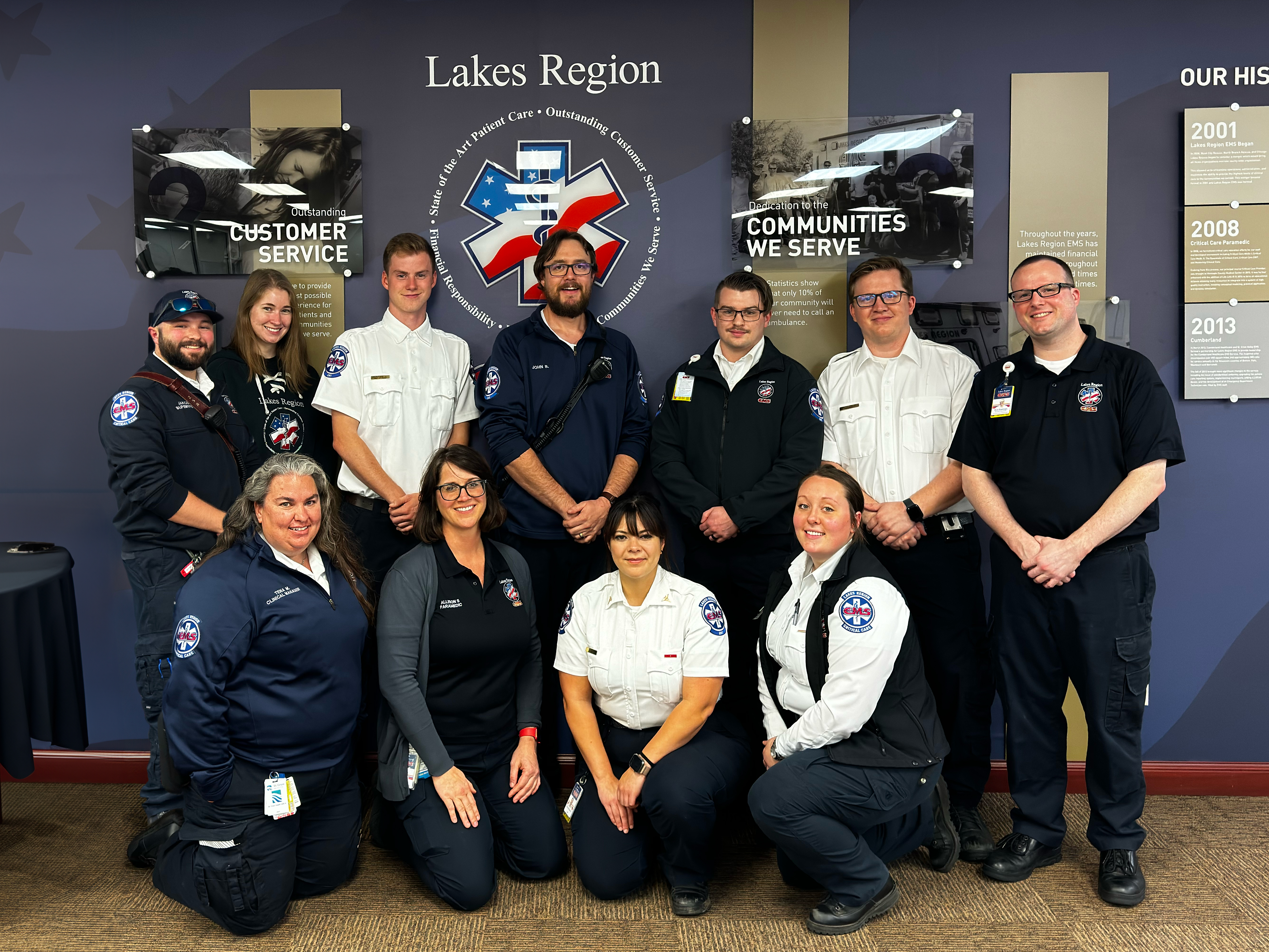 Lakes Region staff smiling for camera